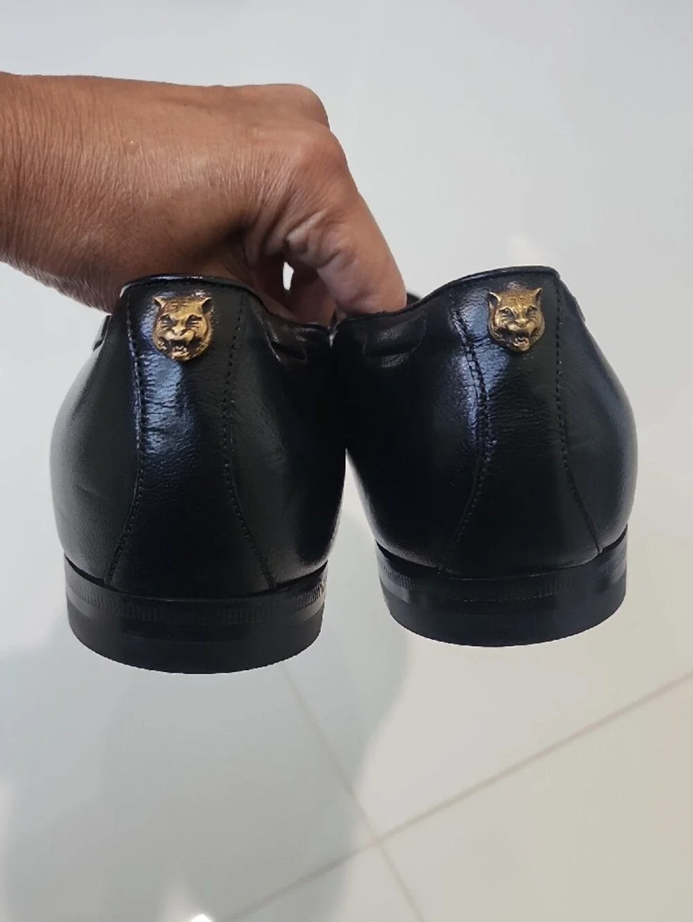 Gucci Black Leather Tassel Loafers with Gold Cat Accent